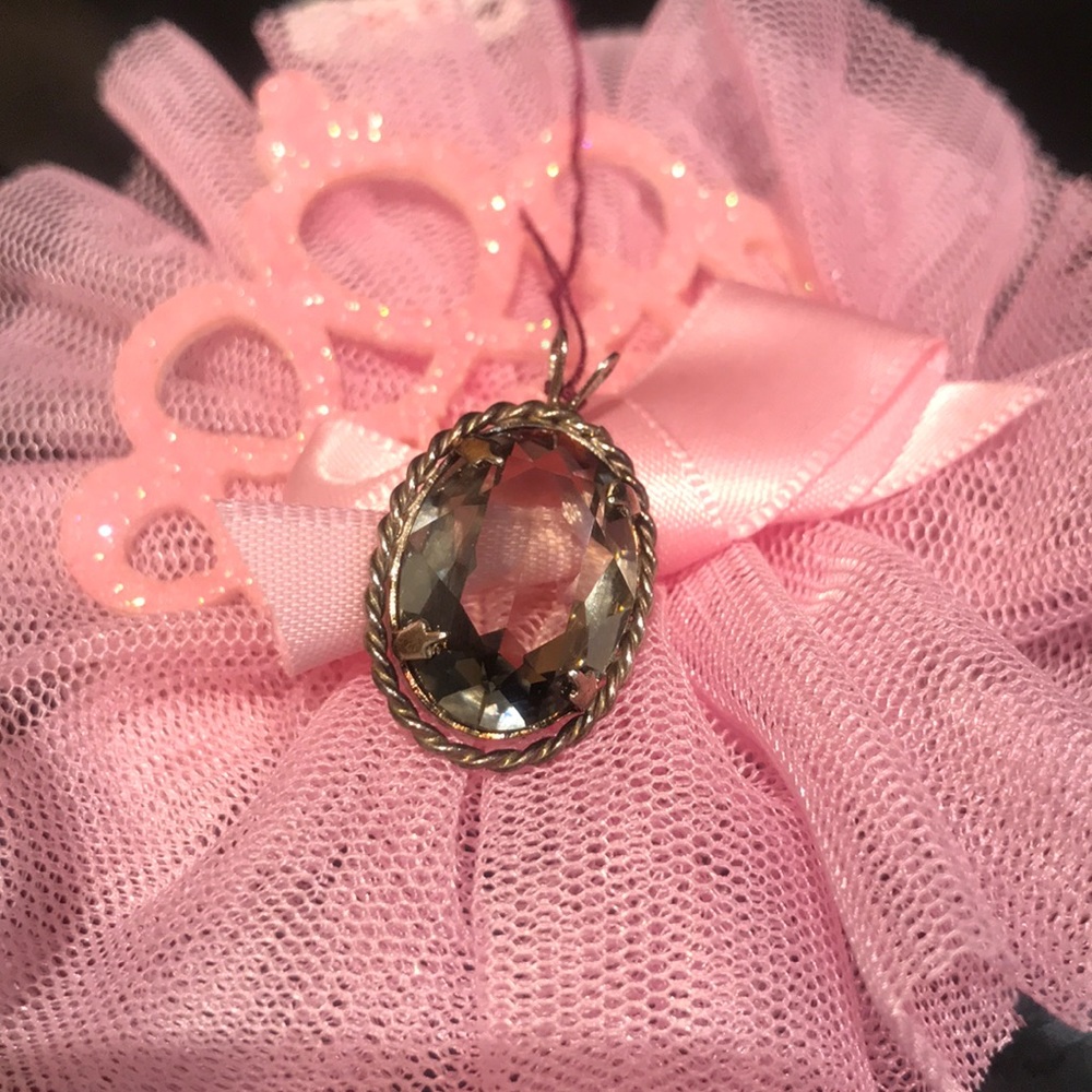 Stealing silver pendant
